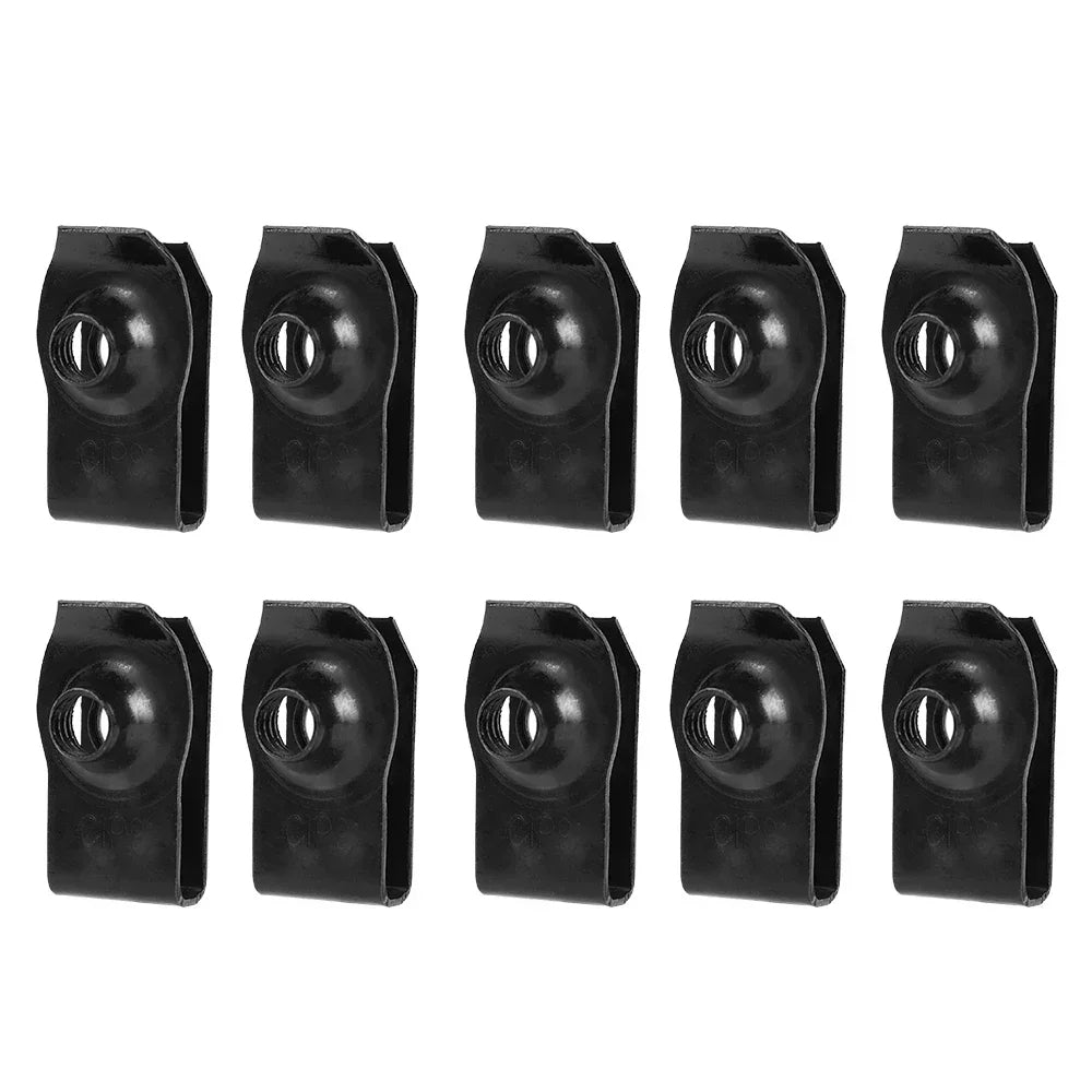 Ten black plastic clips arranged in two rows on a white background