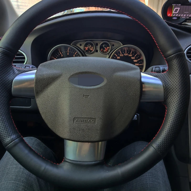 Steering wheel with airbag indicator in a car interior