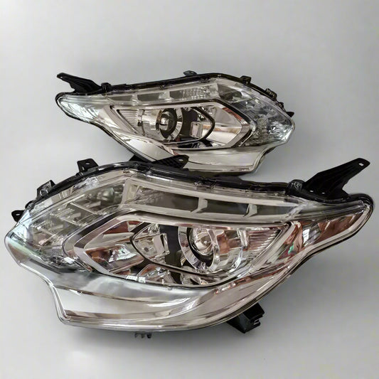Pair of car headlights on a white background