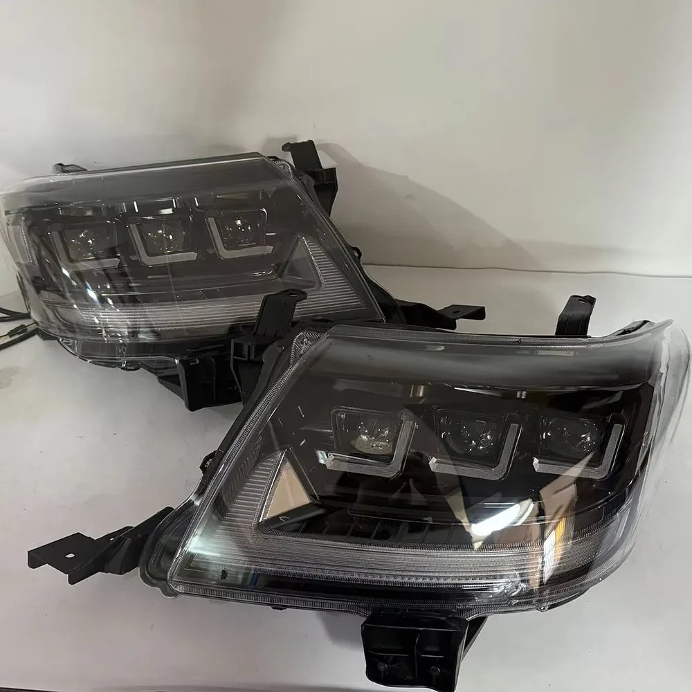 Pair of car headlights on a white background