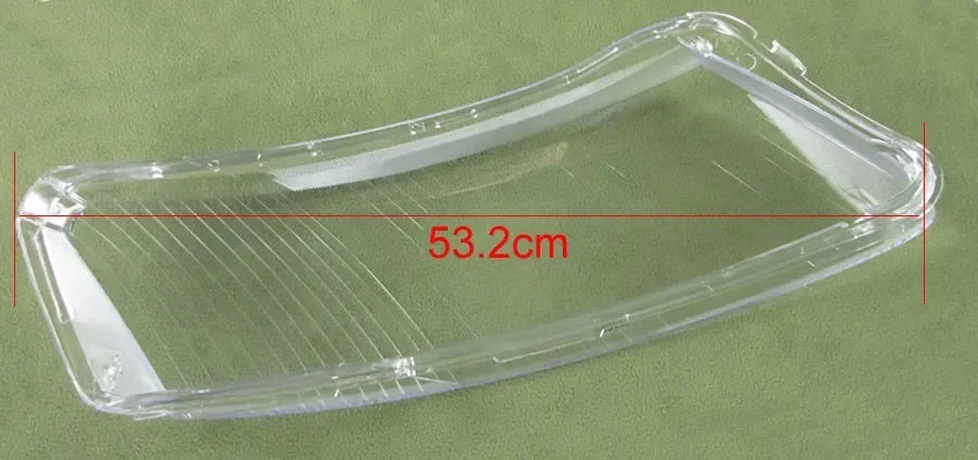 Clear plastic tray with measurement markings on a green background
