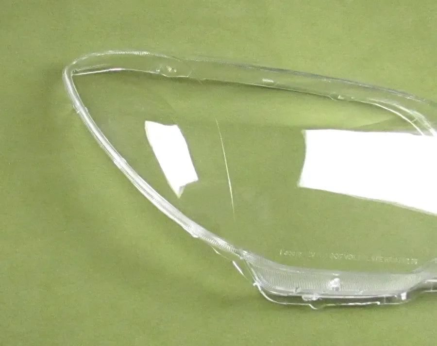 Clear plastic object on a green background