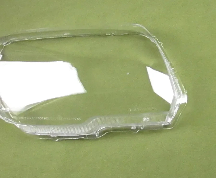 Clear plastic cover on a green background