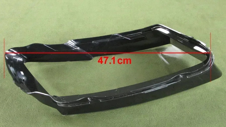 Black car bumper with measurements on a green background