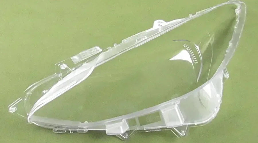 Clear car headlight cover with 'gouhuo' branding on a green background