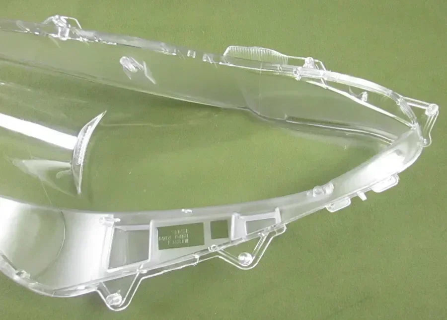 Clear plastic object on a green background