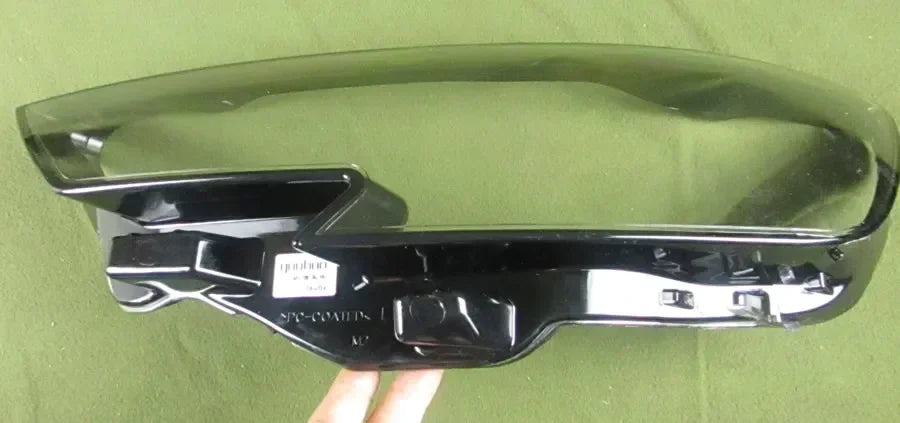 Black car bumper with 'Stingray' branding on a green background