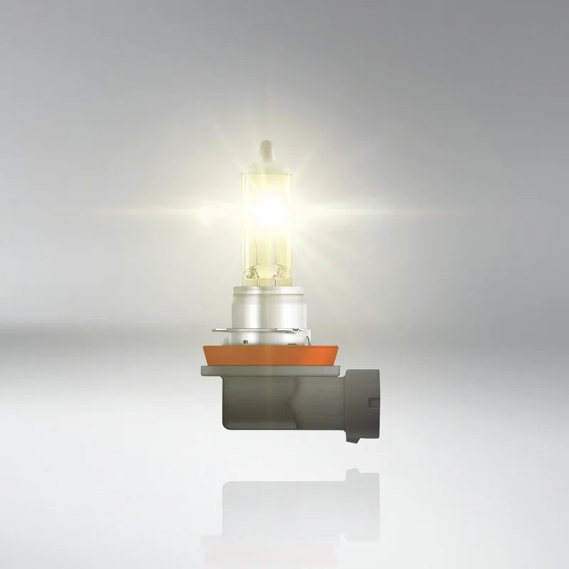 Car headlight bulb on a gray background
