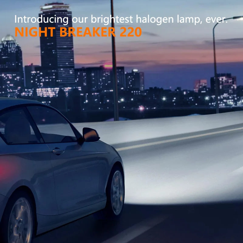 Car on a highway with 'Night Breaker 220' halogen lamp advertisement text.