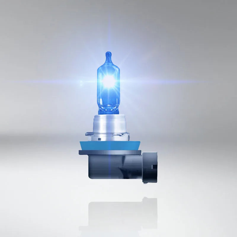 Car headlight bulb with blue glass on a gray background