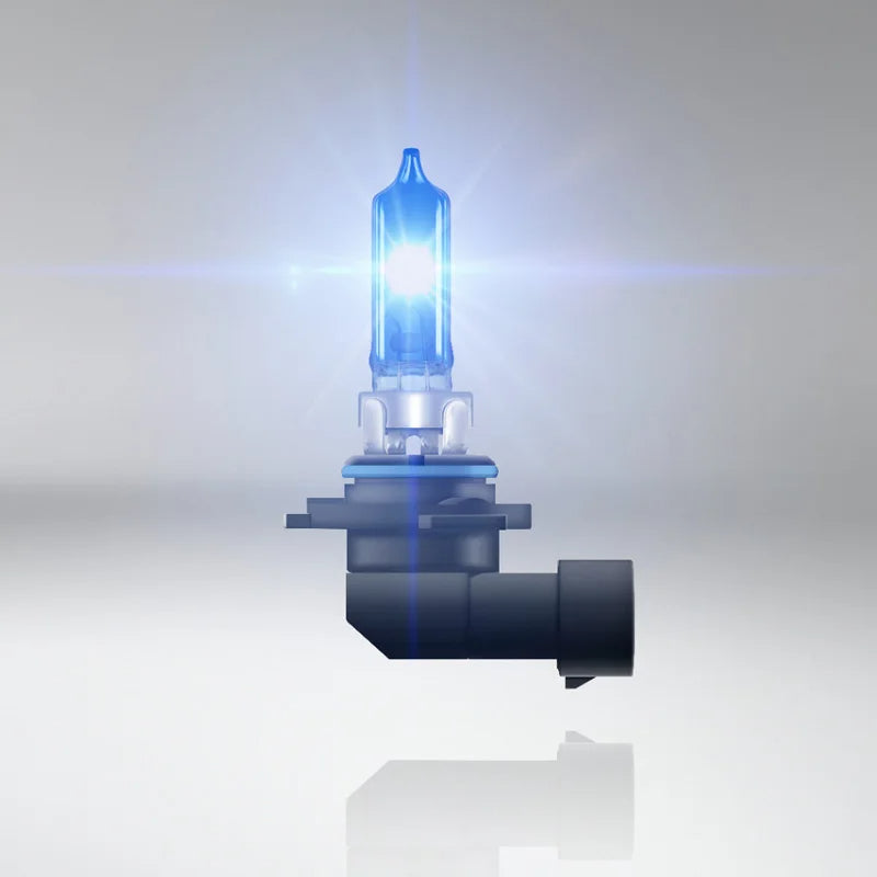 Car headlight bulb with blue light on a white background