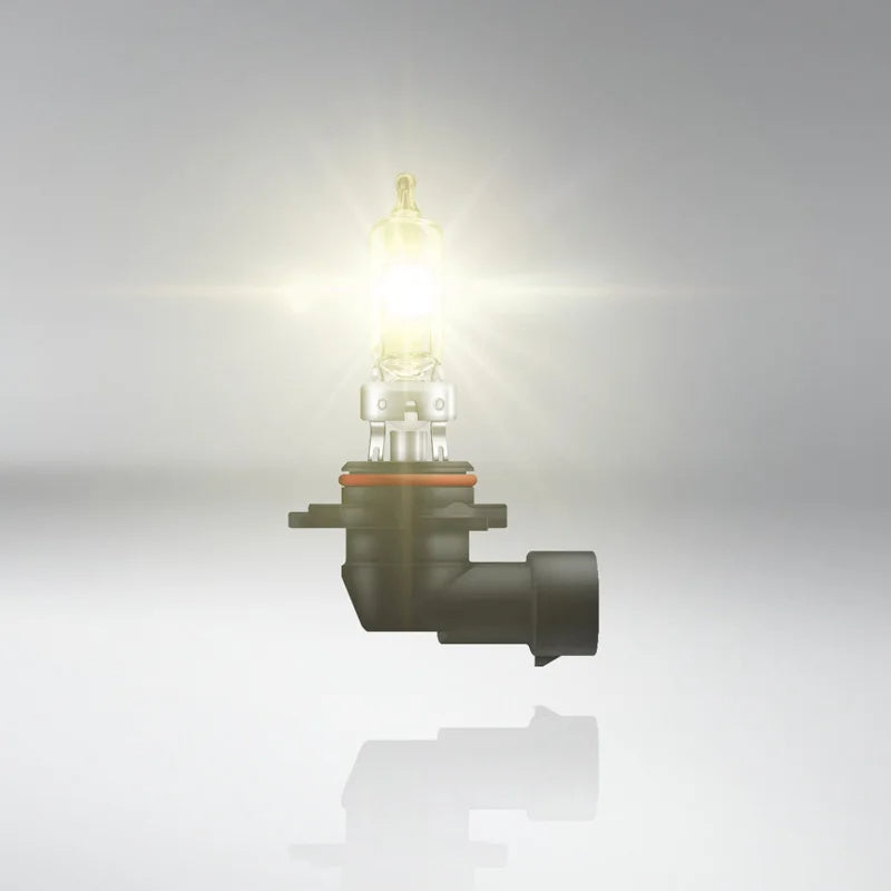 Car headlight bulb on a gray background