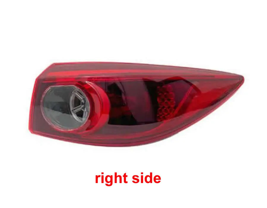 Red car tail light on a white background with 'right side' text.