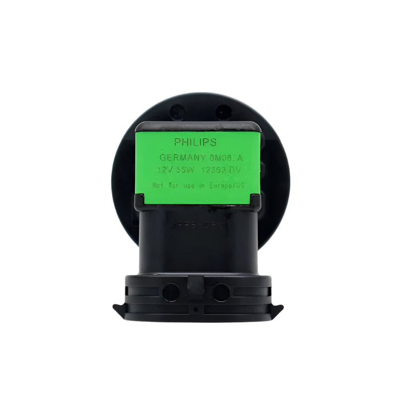 Philips light bulb with green label on a white background
