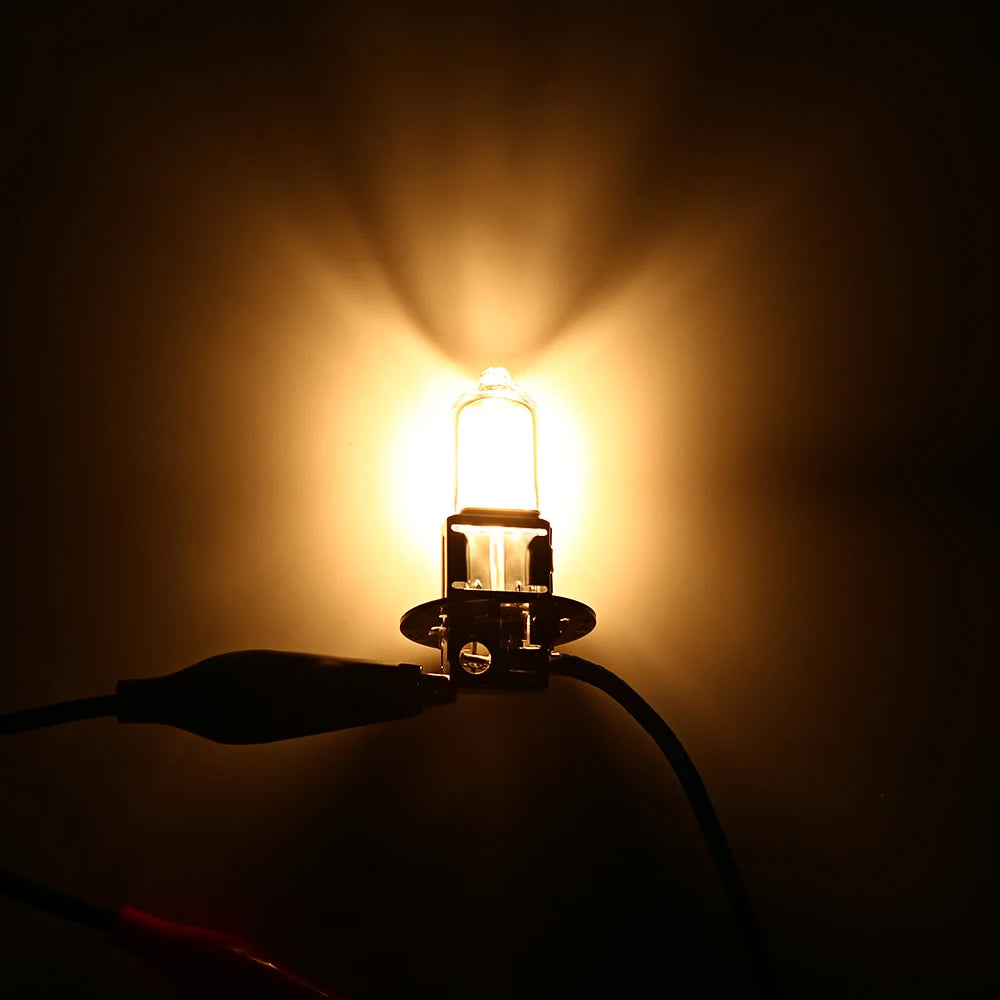 Light bulb emitting a warm glow in a dark setting