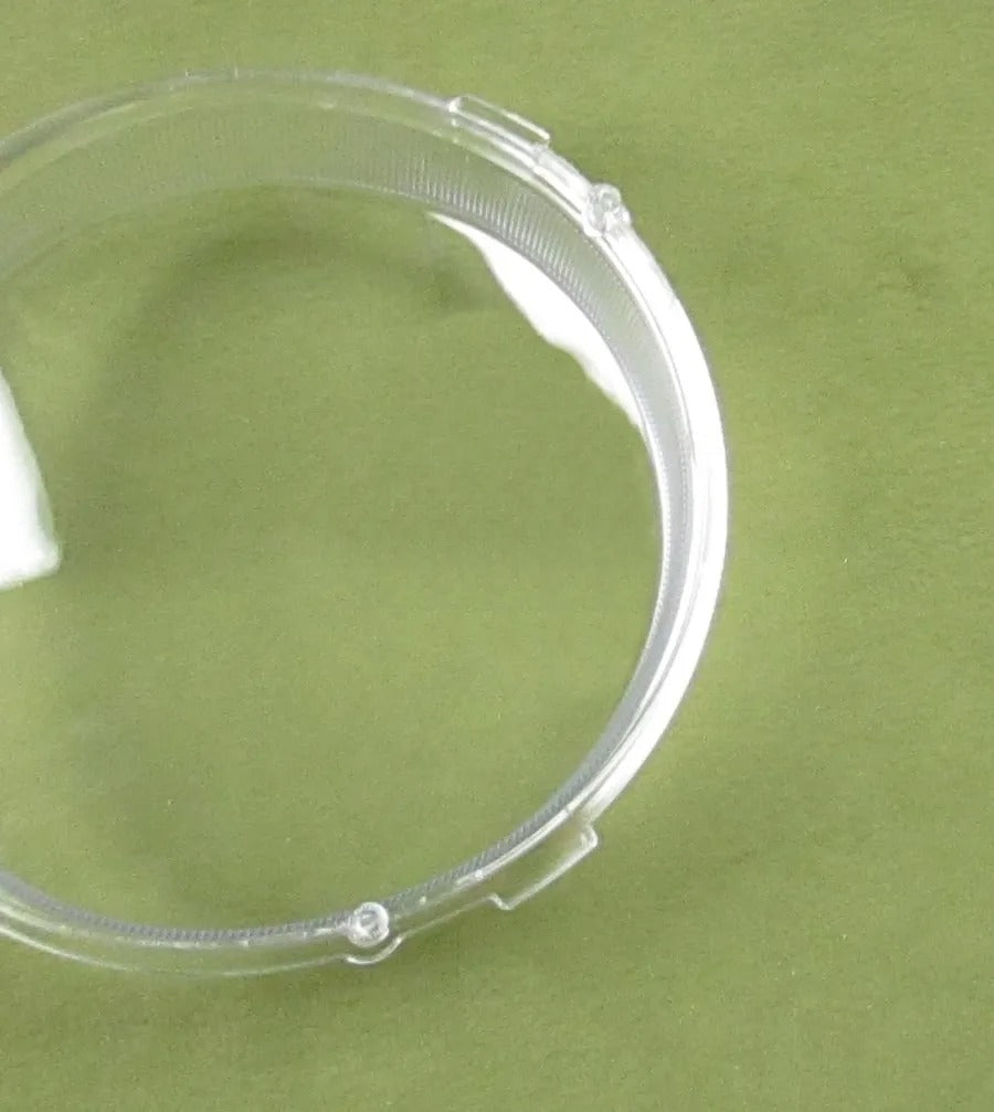 Clear plastic tube on a green background