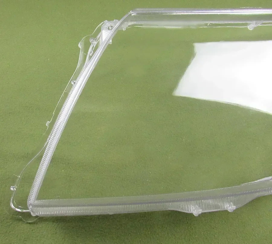 Clear plastic tray on a green background