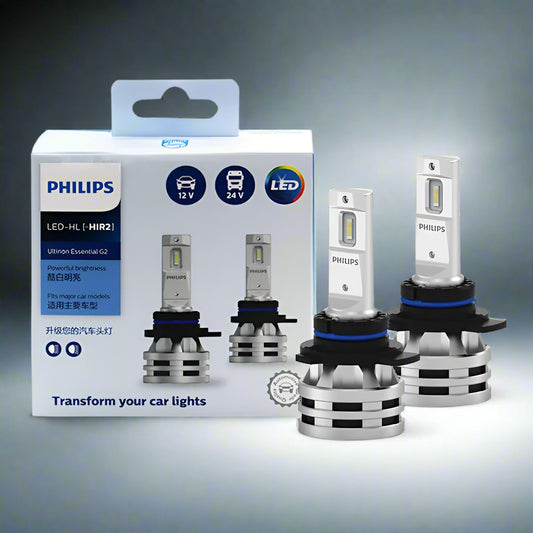 Philips car light bulbs with packaging on a white background