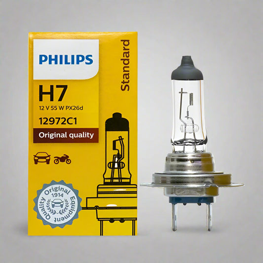 Philips H7 car bulb with packaging on a white background