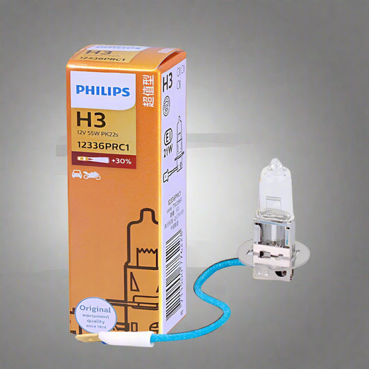 Philips H3 car bulb with packaging on a white background
