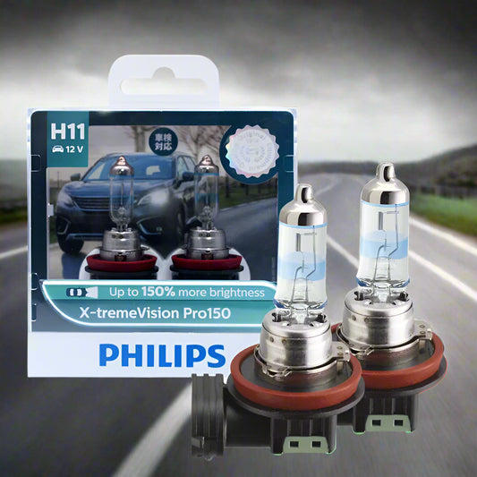 Philips H11 car light bulbs with packaging on a white background